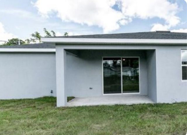 3673 SW Masilunas Street, Port Saint Lucie, FL 34953 Photo