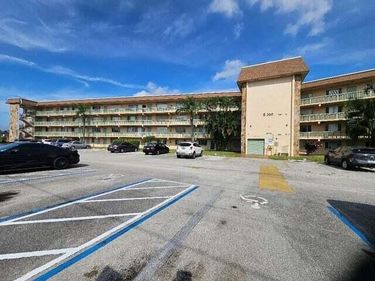 300 Village Green Circle S, Unit 209, Palm Springs, FL 33461