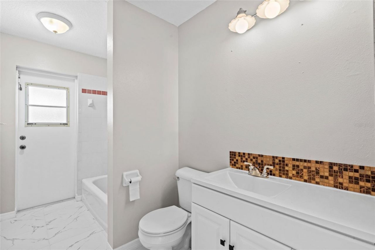 5958 NW Baynard Drive, Port Saint Lucie, FL 34986 Photo