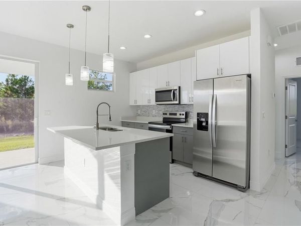 406 Genoa AVE S, LEHIGH ACRES, FL 33974