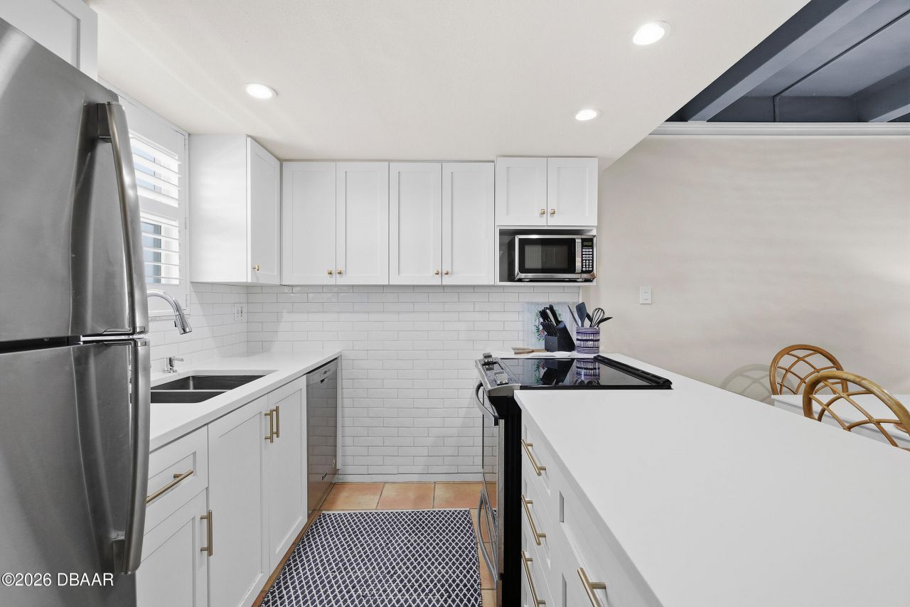 4849 Saxon Drive, Unit C102, New Smyrna Beach, FL 32169 Photo