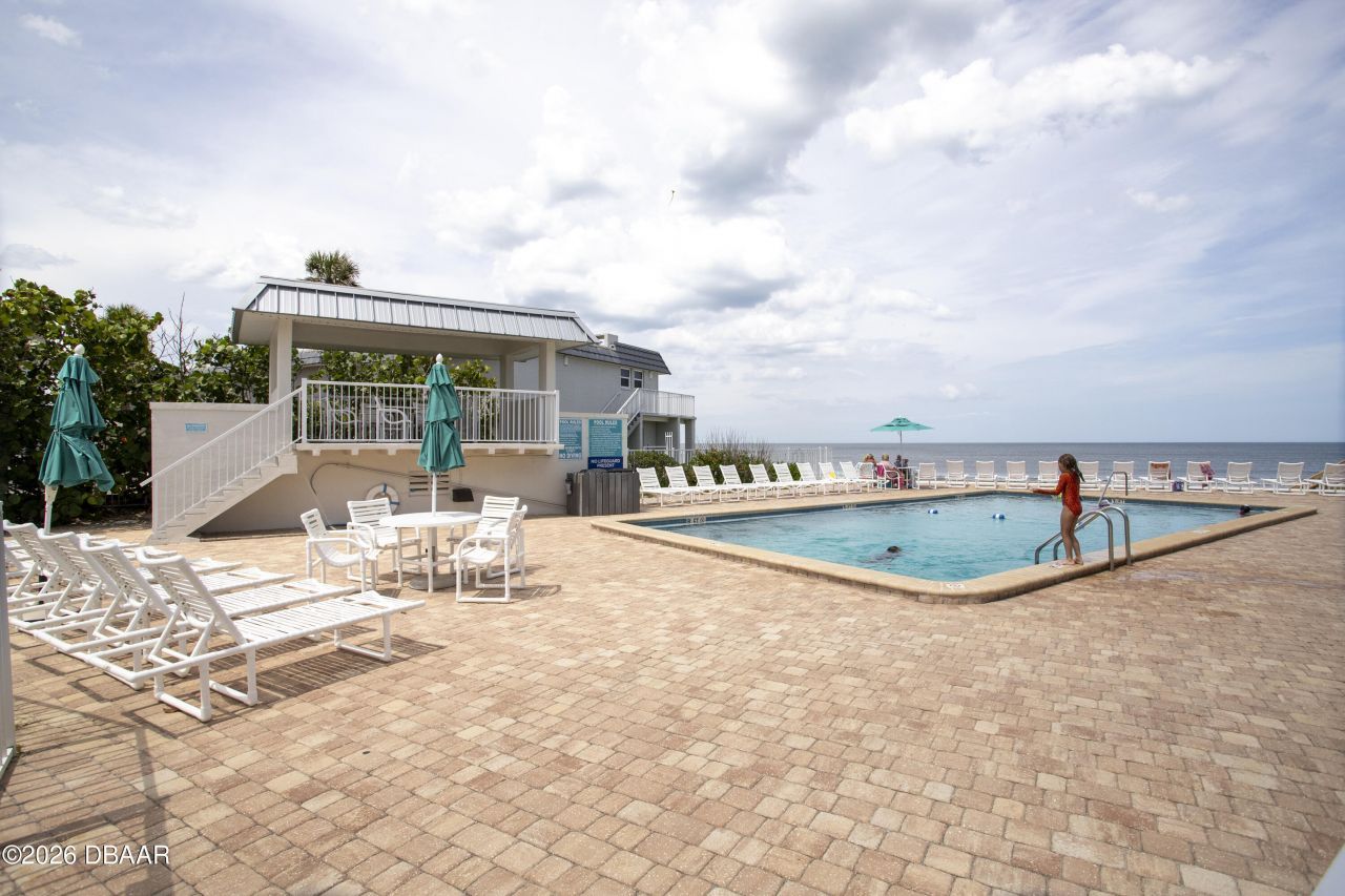 4849 Saxon Drive, Unit C102, New Smyrna Beach, FL 32169 Photo