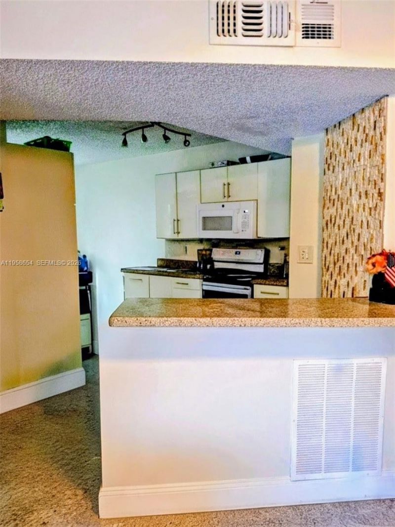 8801 Wiles Rd, Unit 208, Coral Springs, FL 33067 Photo