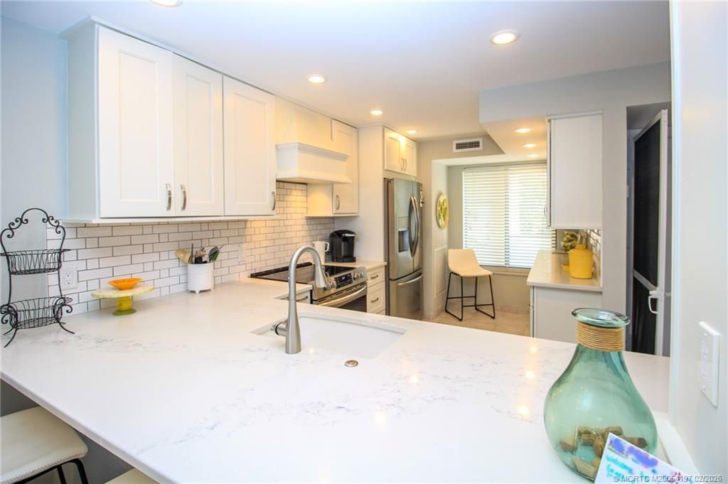 4720 NE Sandpebble Trace, Unit 203, Stuart, FL 34996 Photo