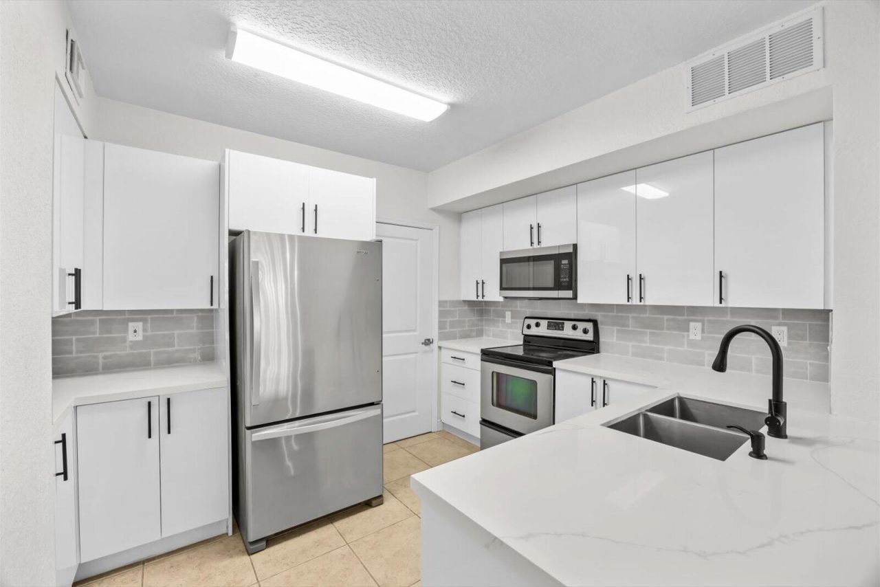 158 SW Peacock Boulevard, Unit 30-104, Port Saint Lucie, FL 34986 Photo