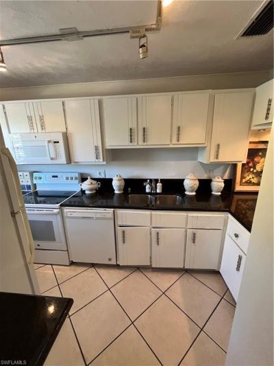 5379 Treetops Dr, Unit M203, Naples, FL 34113 Photo
