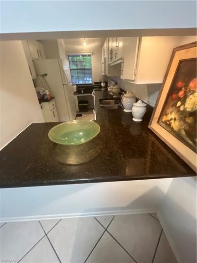 5379 Treetops Dr, Unit M203, Naples, FL 34113 Photo