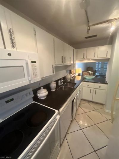 5379 Treetops Dr, Unit M203, Naples, FL 34113 Photo