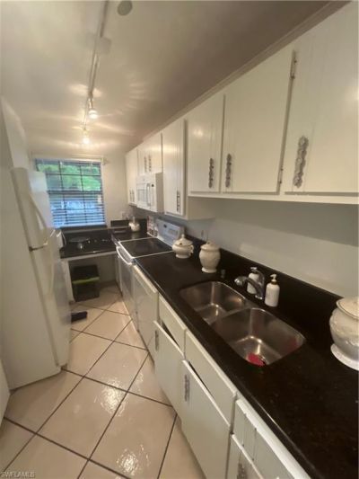 5379 Treetops Dr, Unit M203, Naples, FL 34113 Photo