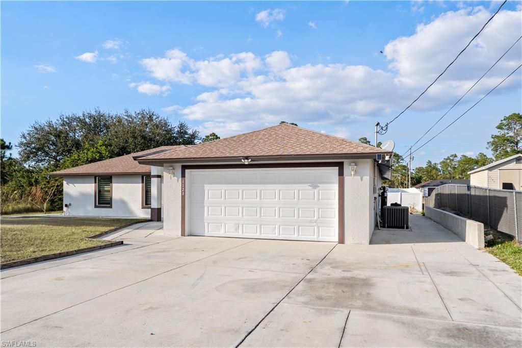 1123 Summa Blvd, Lehigh Acres, FL 33974 Photo
