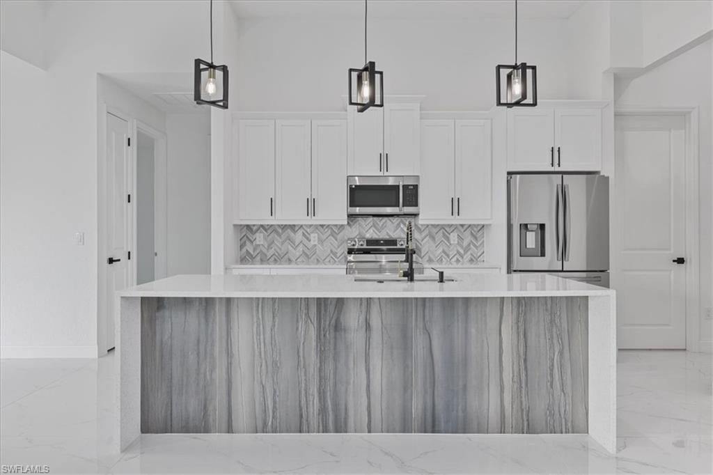 1310 NE 7th Pl, Cape Coral, FL 33909 Photo