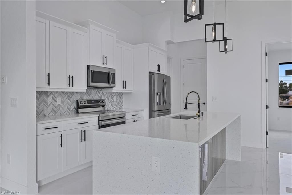 1310 NE 7th Pl, Cape Coral, FL 33909 Photo