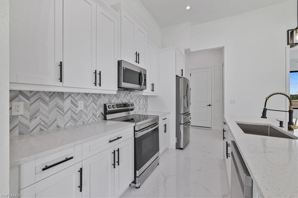 1310 NE 7th Pl, Cape Coral, FL 33909 Photo