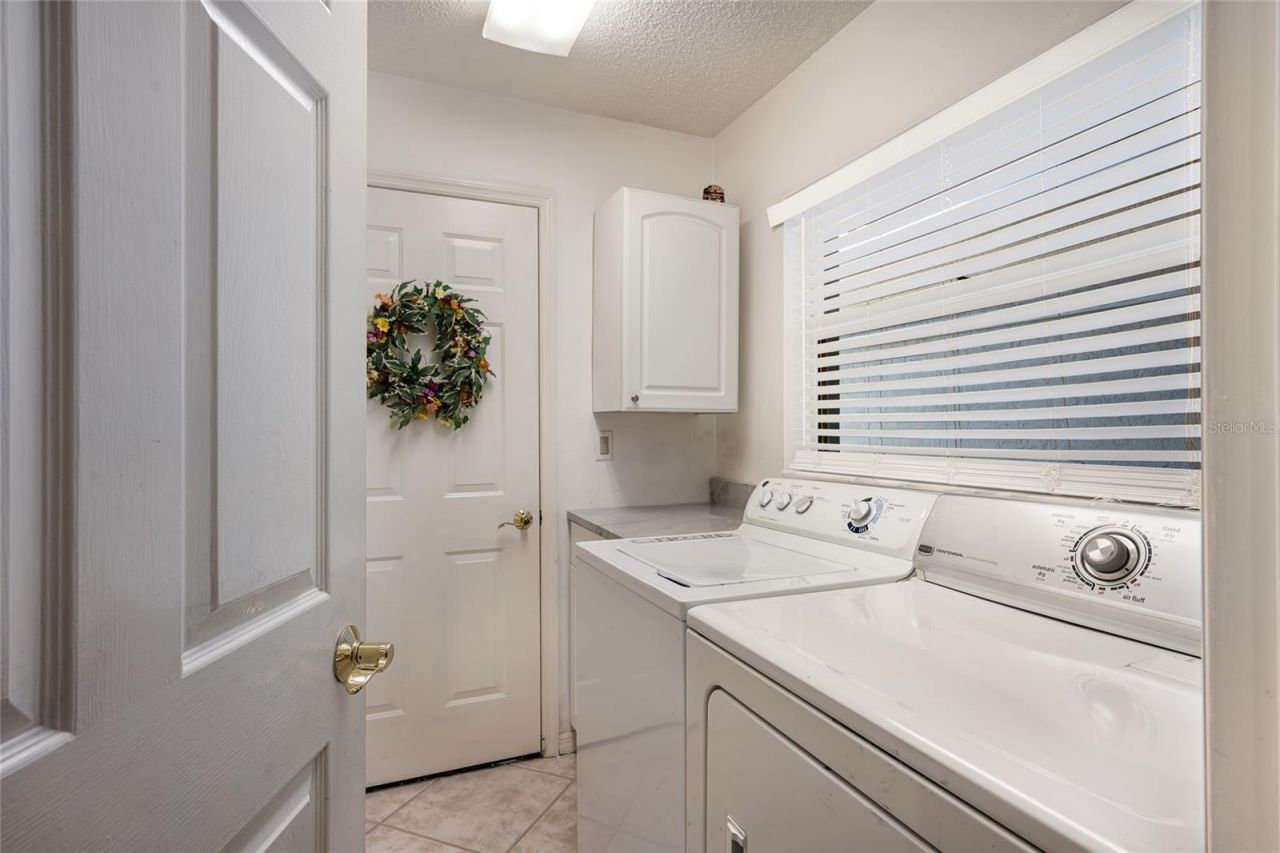 5590 Golf Pointe Drive, Unit 5590, Sarasota, FL 34243 Photo