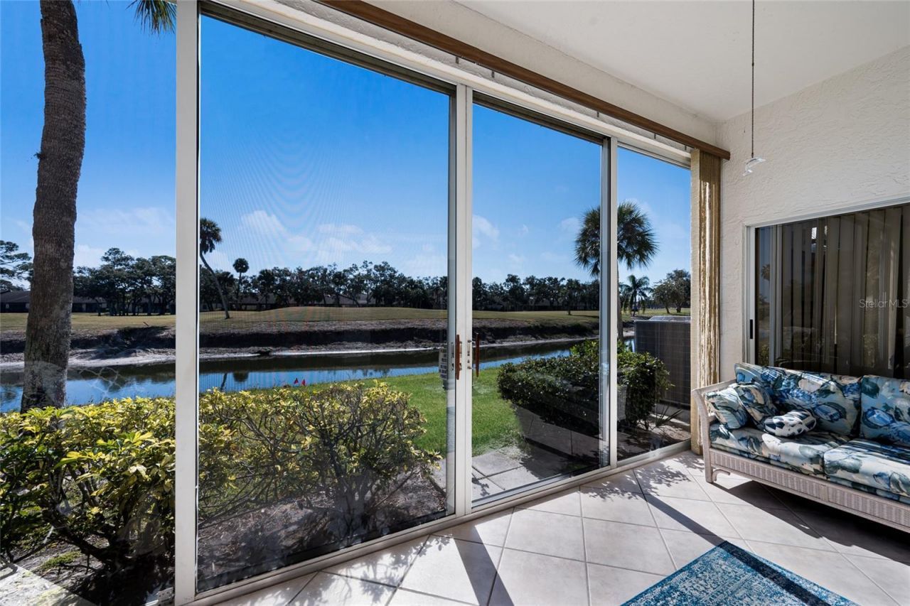 5590 Golf Pointe Drive, Unit 5590, Sarasota, FL 34243 Photo