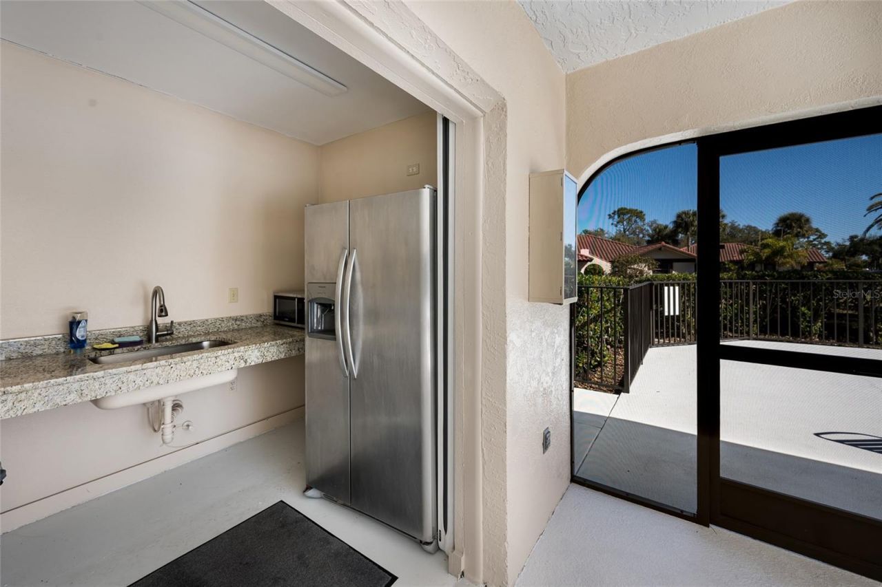 5590 Golf Pointe Drive, Unit 5590, Sarasota, FL 34243 Photo