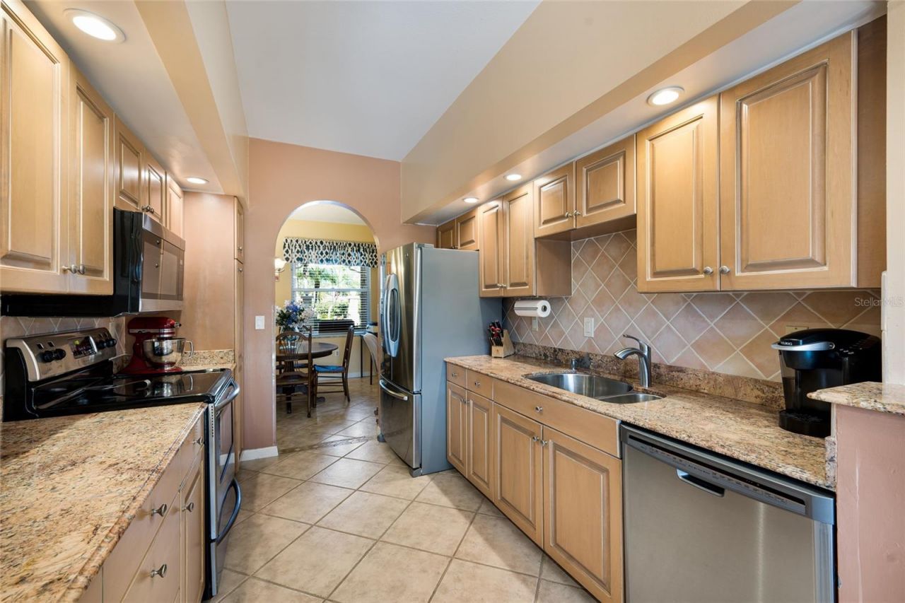 5590 Golf Pointe Drive, Unit 5590, Sarasota, FL 34243 Photo