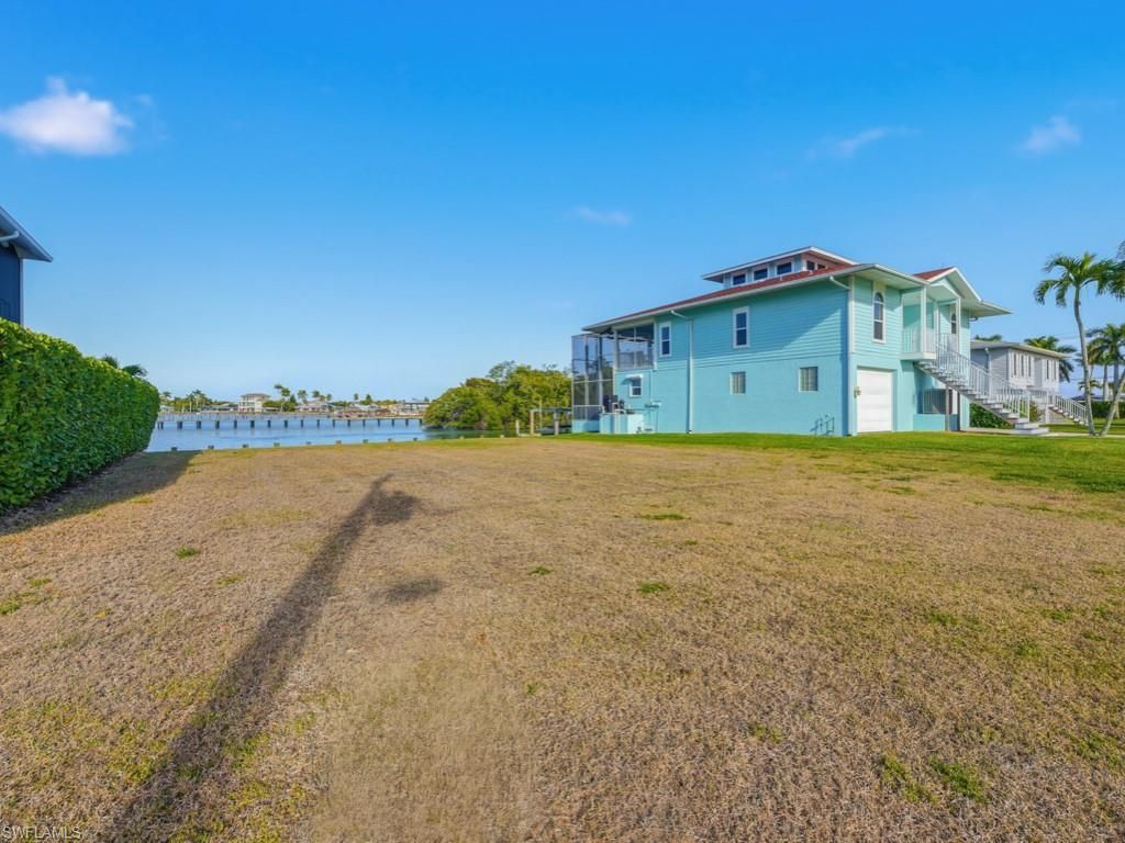 107 Pago Pago Dr W, Naples, FL 34113 Photo