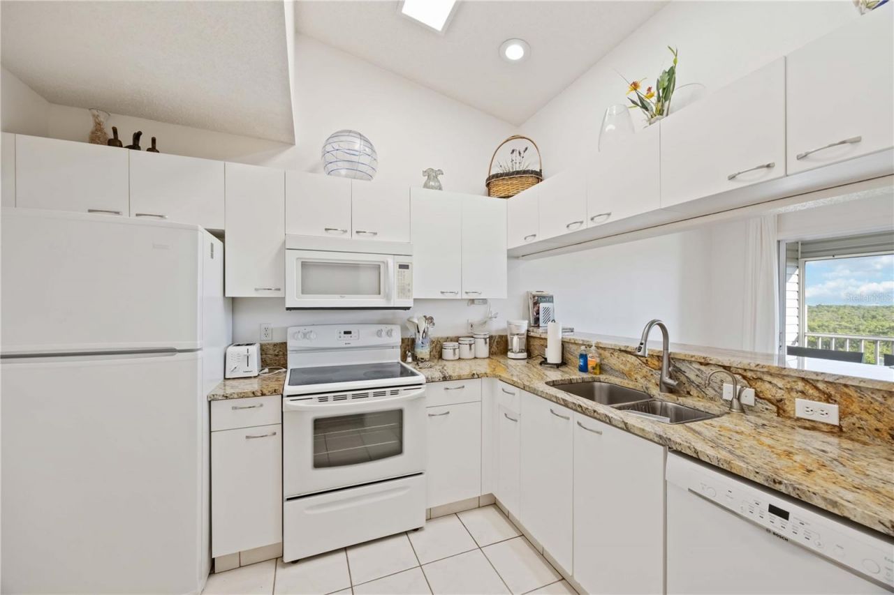 3607 E Bay Drive, Unit 206, Holmes Beach, FL 34217 Photo