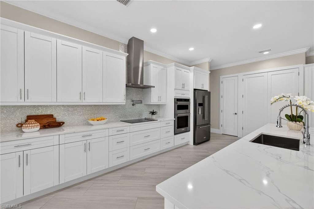 6461 Livingston Woods Ln, Naples, FL 34109 Photo