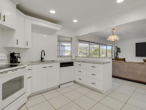 7 Greenway Village N, Unit 202, Royal Palm Beach, FL 33411