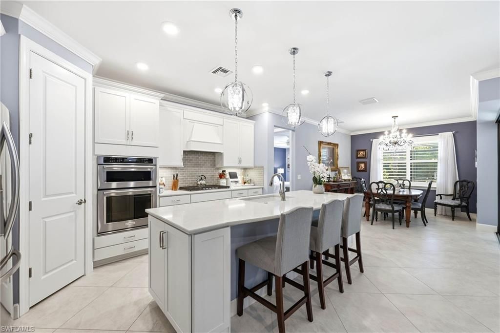 6844 Winding Cypress Dr, Naples, FL 34114 Photo