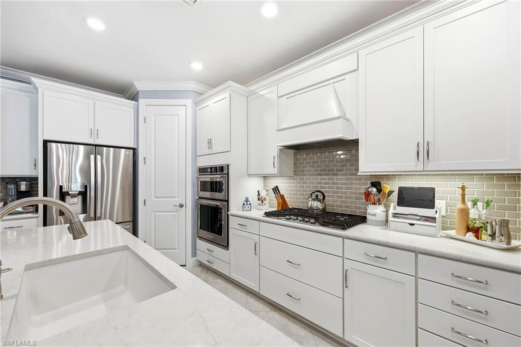 6844 Winding Cypress Dr, Naples, FL 34114 Photo