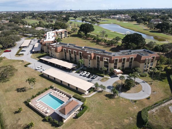 5390 Woodland Lakes Drive, Unit 201, Palm Beach Gardens, FL 33418