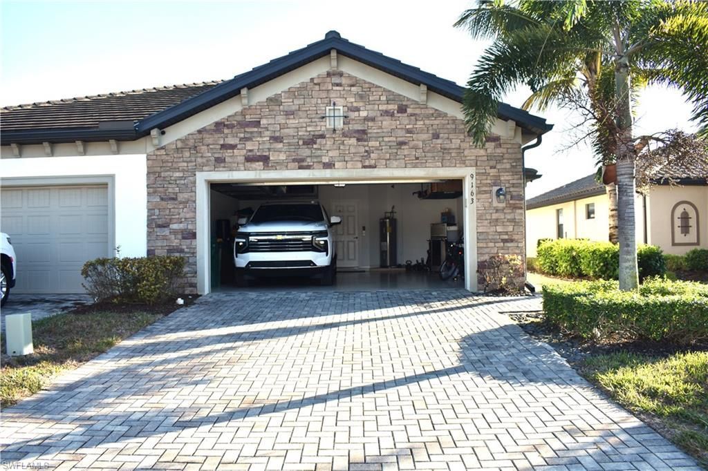 9163 Woodhurst Dr, Naples, FL 34120 Photo
