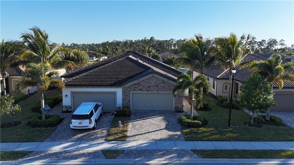 9163 Woodhurst Dr, Naples, FL 34120 Photo
