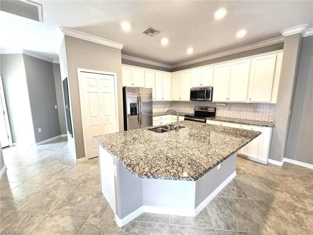 9163 Woodhurst Dr, Naples, FL 34120 Photo