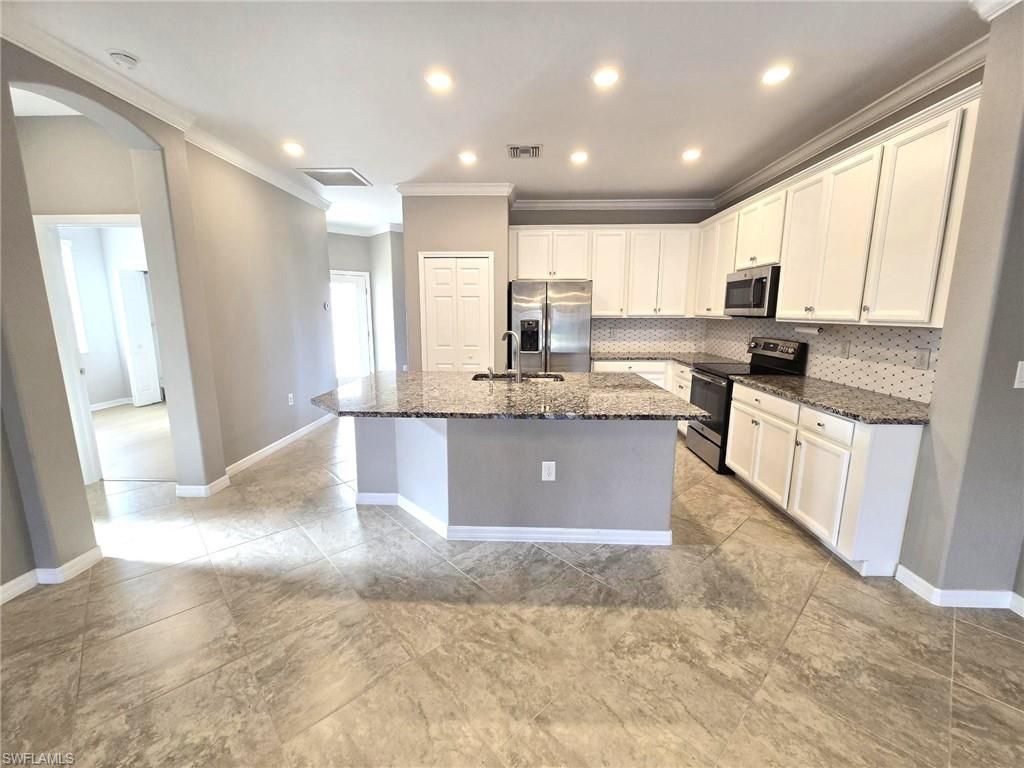 9163 Woodhurst Dr, Naples, FL 34120 Photo