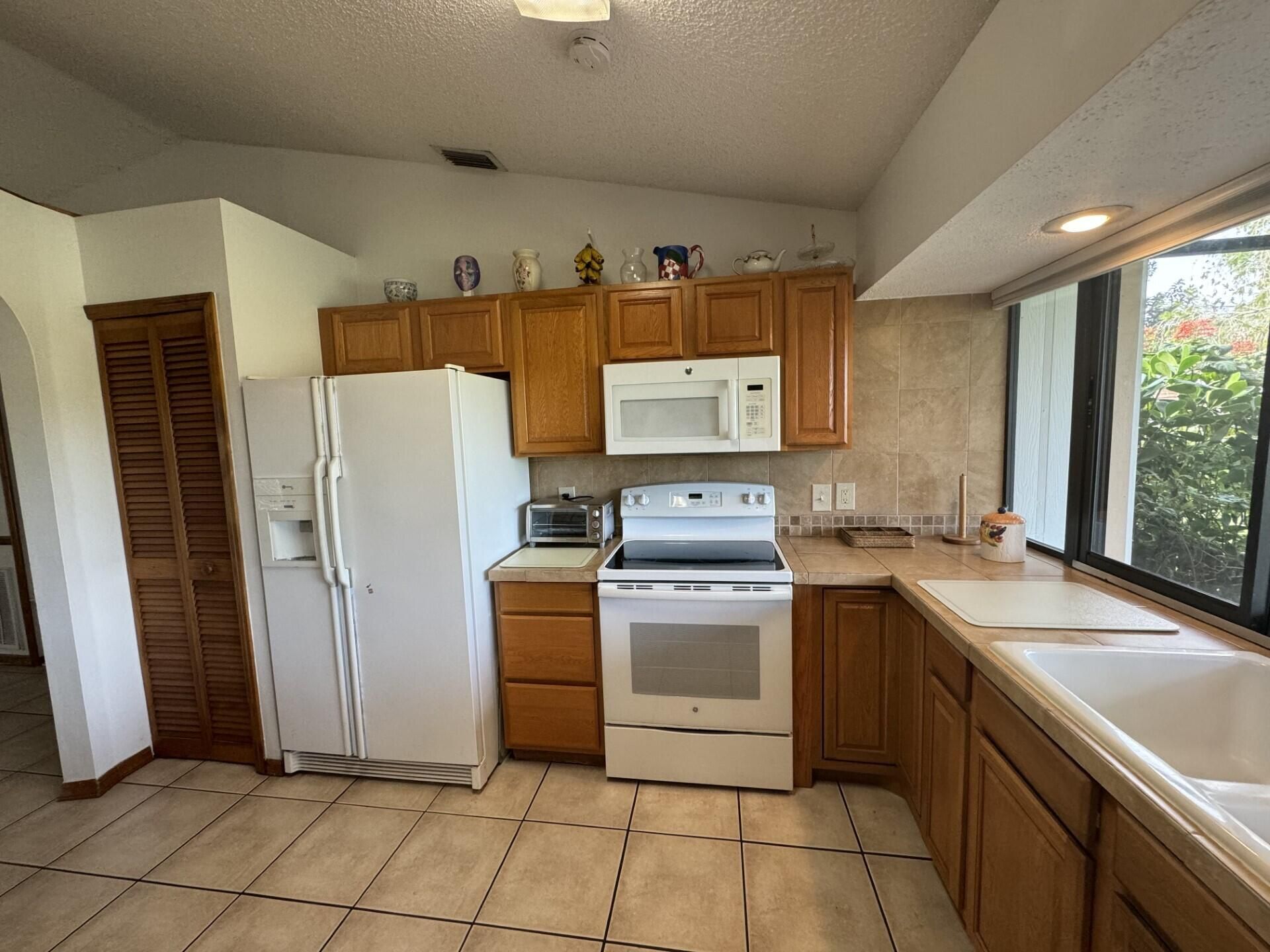 6774 NW Abigail Avenue, Port Saint Lucie, FL 34983 Photo