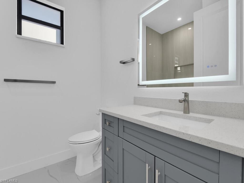 1033 Bassinger Ave S, Lehigh Acres, FL 33974 Photo