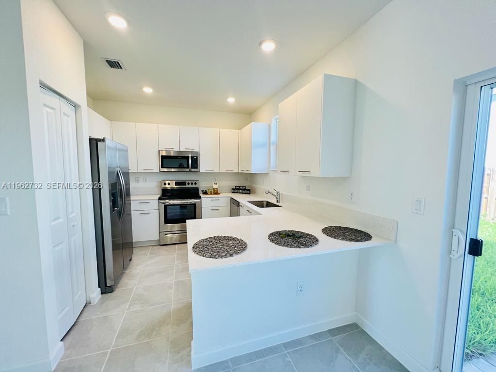 12612 NW 23rd Pl, Unit 12612, Miami, FL 33167 Photo