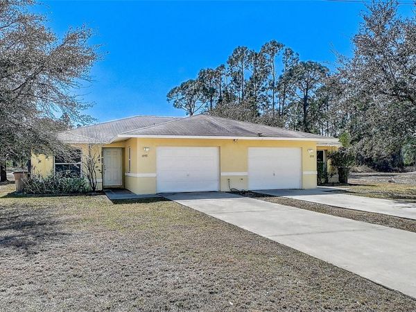 1090 JAGUAR BOULEVARD, LEHIGH ACRES, FL 33974