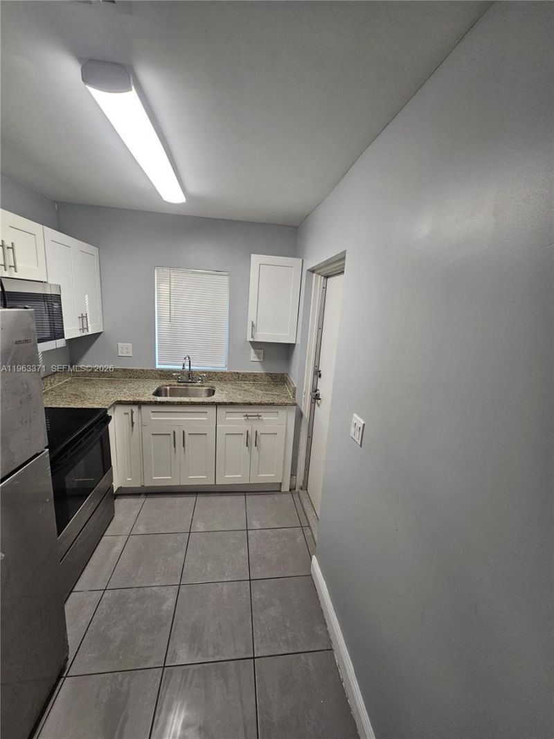 1128 NW 101st St , Miami, FL 33150 Photo