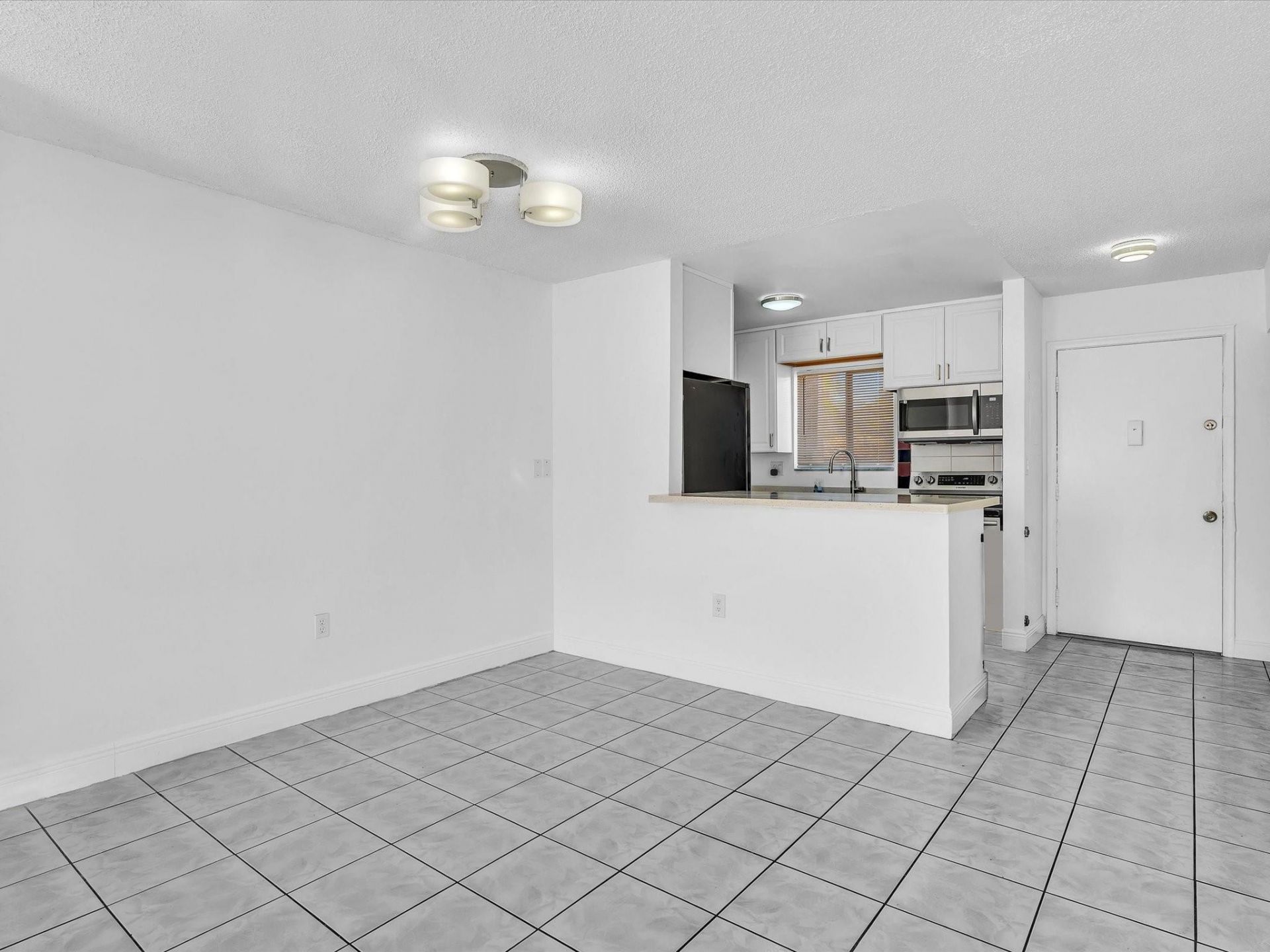 6034 Forest Hill Boulevard, Unit 107, West Palm Beach, FL 33415 Photo