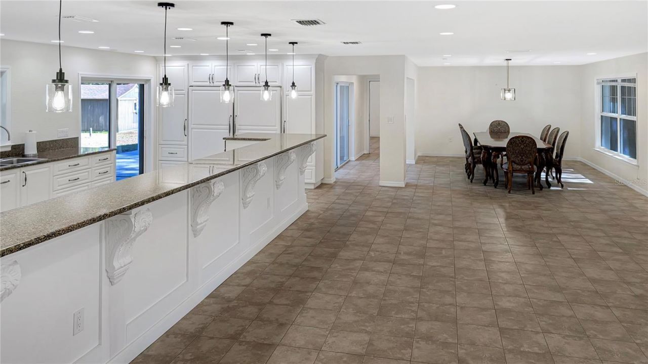 7129 Oakwind Drive, Orlando, FL 32818 Photo