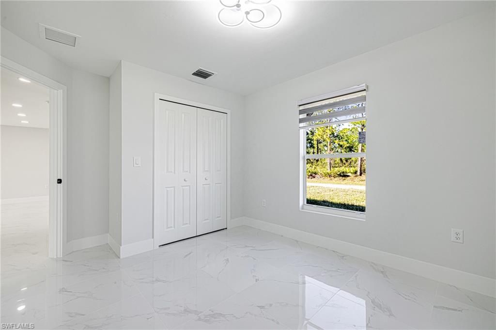 1120 Ravenswood St E, Lehigh Acres, FL 33974 Photo
