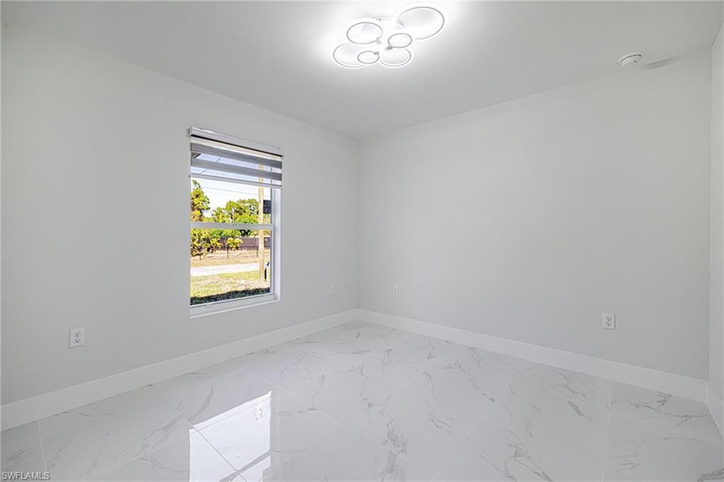 1120 Ravenswood St E, Lehigh Acres, FL 33974 Photo