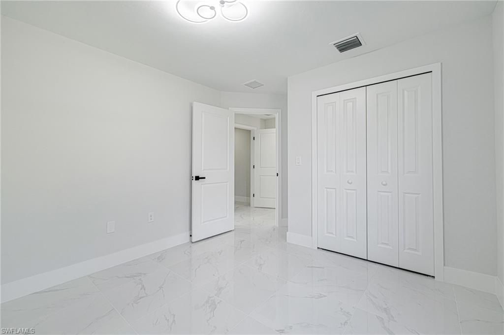 1120 Ravenswood St E, Lehigh Acres, FL 33974 Photo