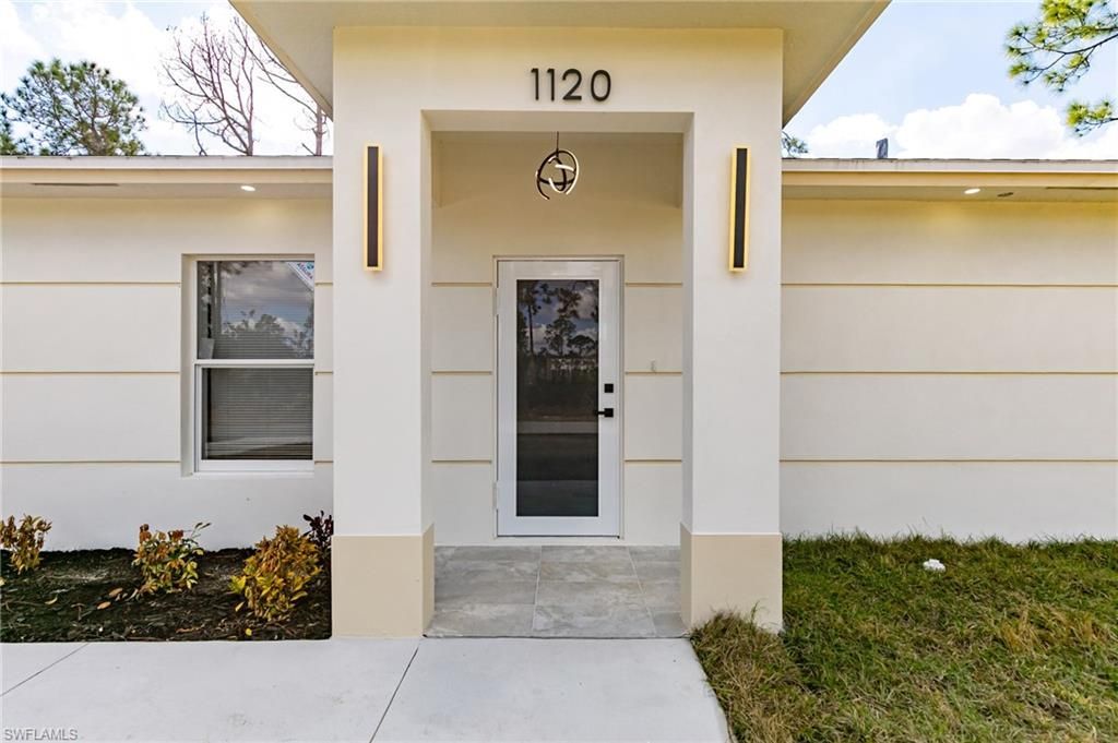 1120 Ravenswood St E, Lehigh Acres, FL 33974 Photo