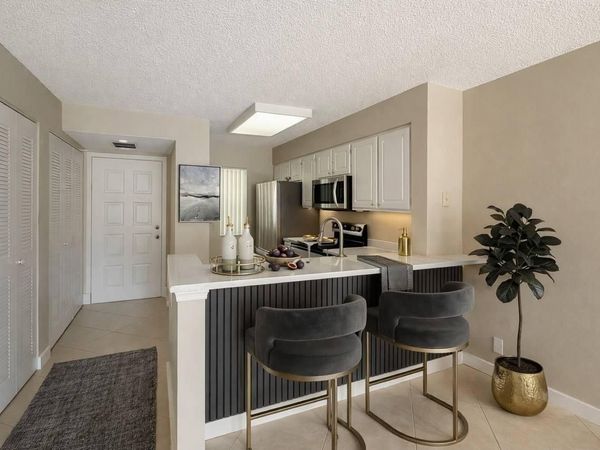 2228 N Cypress Bend Drive, Unit 407, Pompano Beach, FL 33069