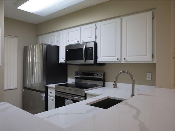 2228 N Cypress Bend Drive, Unit 407, Pompano Beach, FL 33069