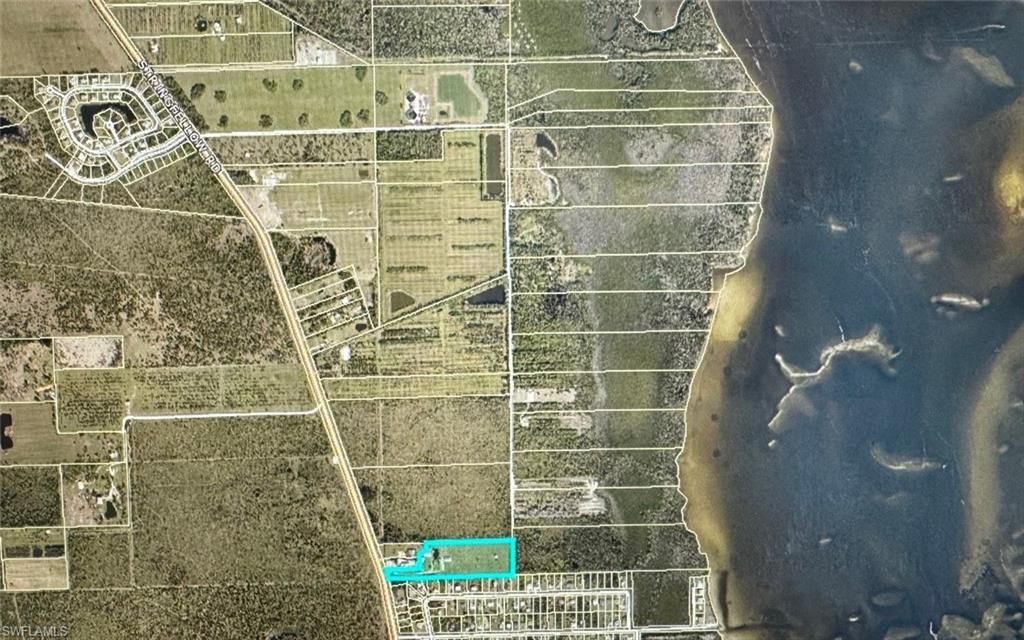 6050 Stringfellow Rd, Saint James City, FL 33956 Photo