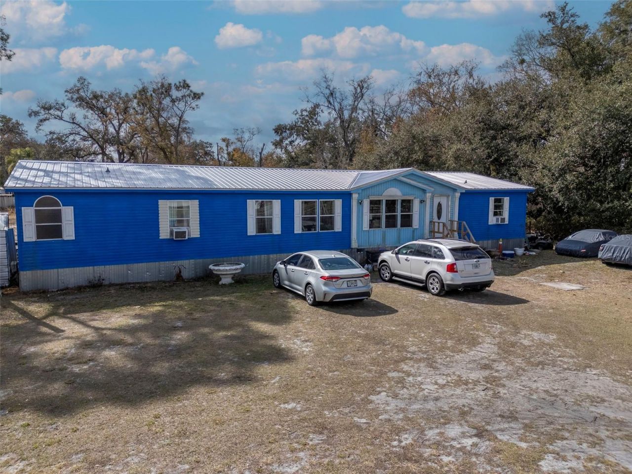 6905 W Knights Griffin Road, Plant City, FL 33565 Main Photo