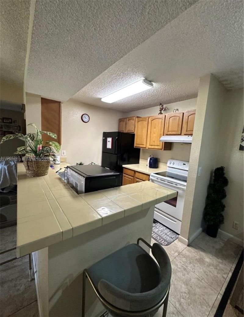 4025 W Mcnab Rd, Unit E208, Pompano Beach, FL 33069 Photo