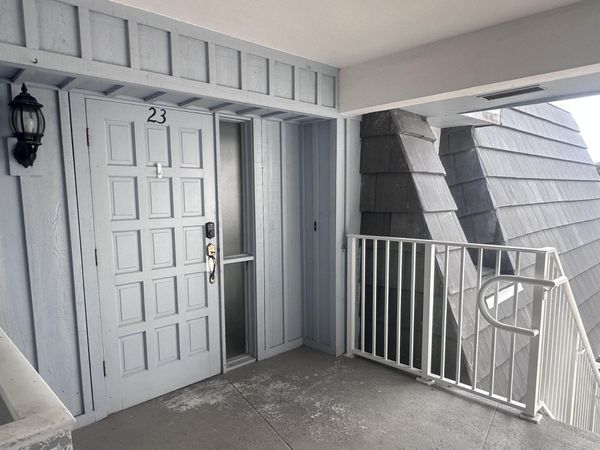 423 Pine Tree Court, Unit 23, Atlantis, FL 33462