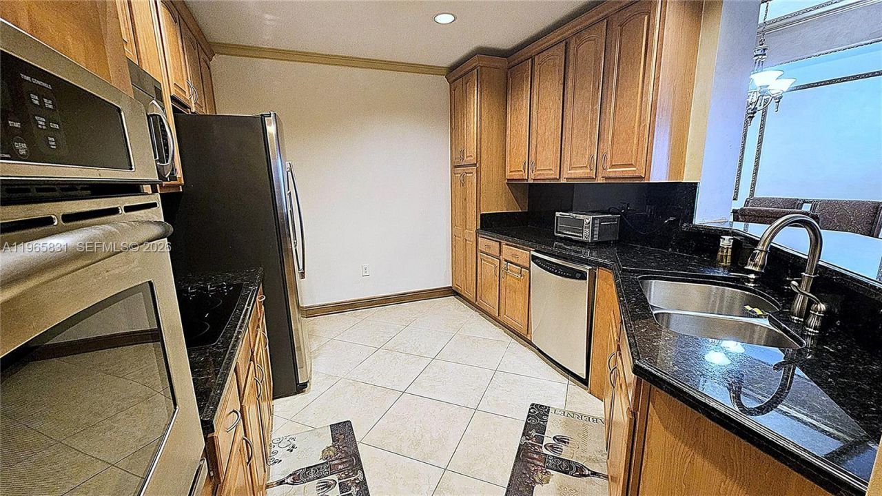 16102 Emerald Estates Dr , Unit 306, Weston, FL 33331 Photo